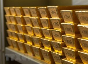 Giá vàng thế giới dao động quanh mức thấp nhất 5 tháng qua
